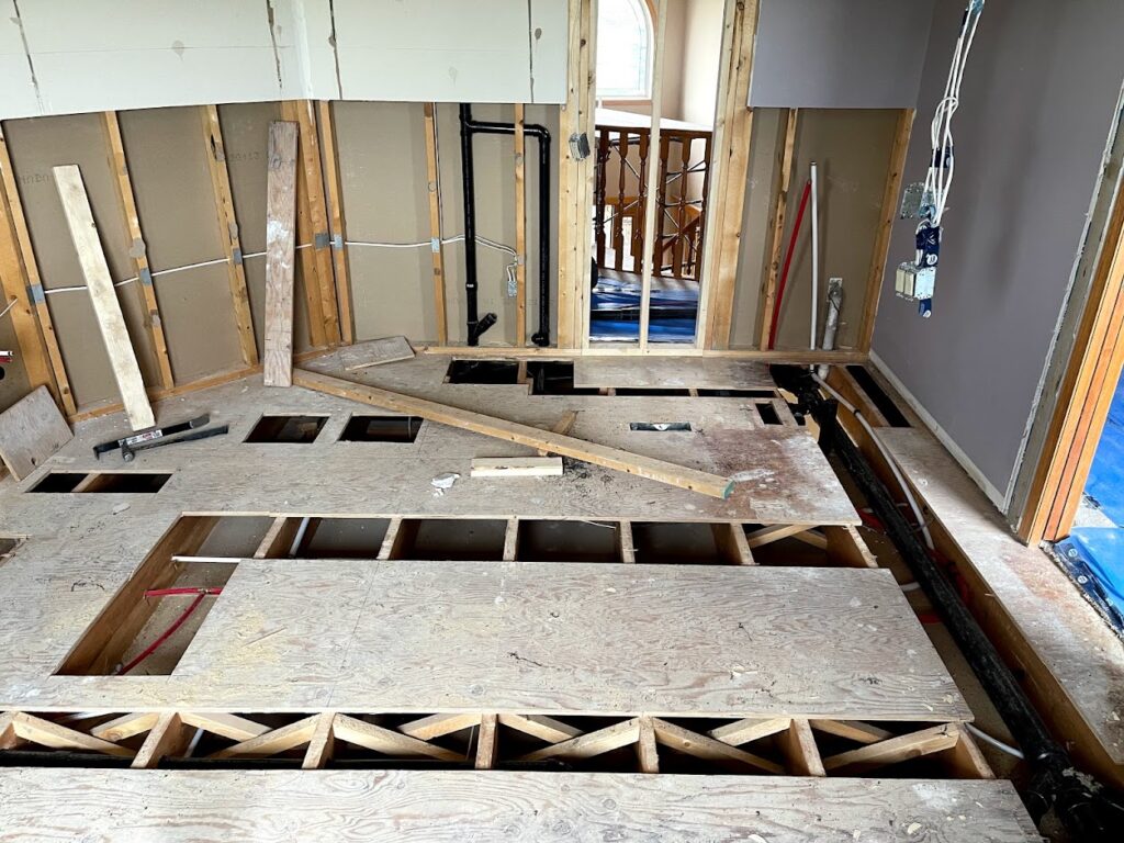 Basement renovation framing and flooring work in Calgary