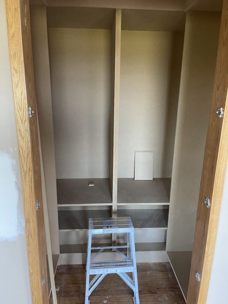 Custom storage cabinet installation for Calgary kitchen remodel