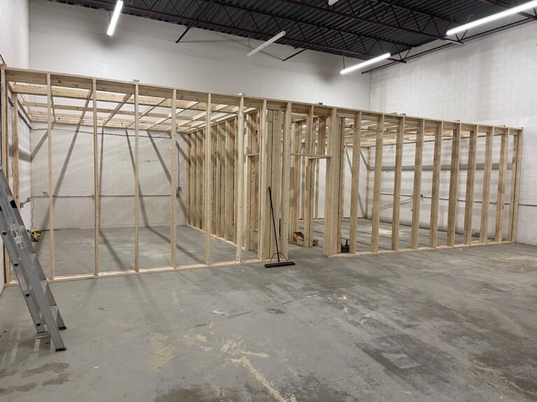 Basement interior framing work during Calgary renovation project