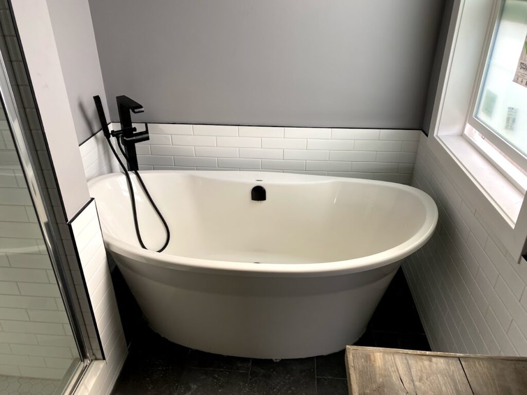 Freestanding bathtub installed during Calgary bathroom renovation
