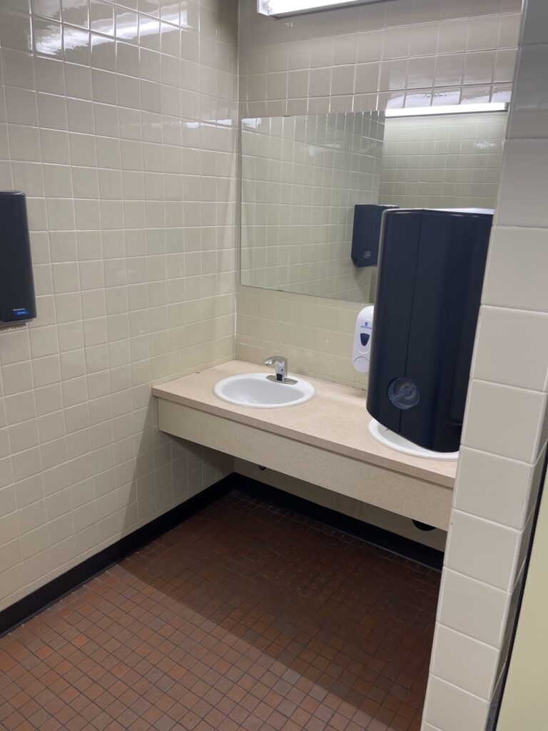Finished bathroom renovation with updated fixtures in Calgary home