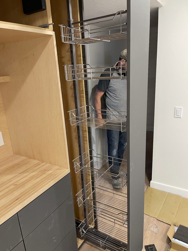 Built-in desk and cabinet storage installation in Calgary residence