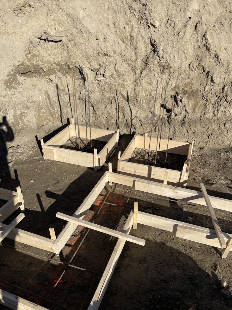 Excavation and foundation preparation for residential construction in Calgary