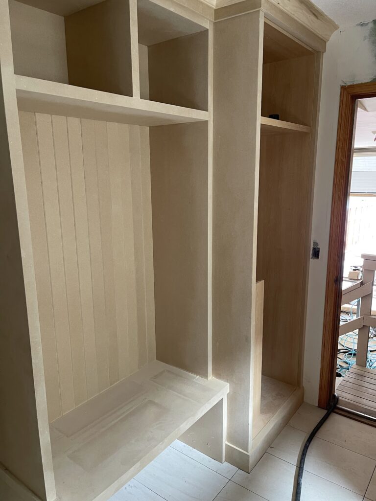 Custom closet storage with built-in shelving in Calgary home
