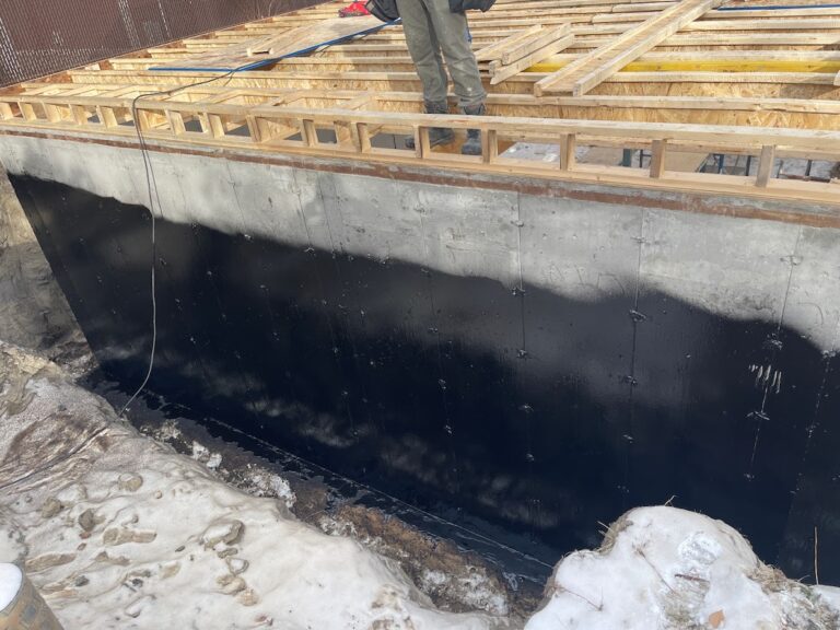 Exterior foundation renovation work for a Calgary residential property