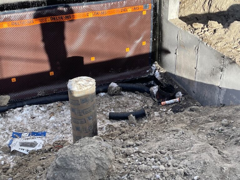 Foundation finishing work during a complete Calgary home addition