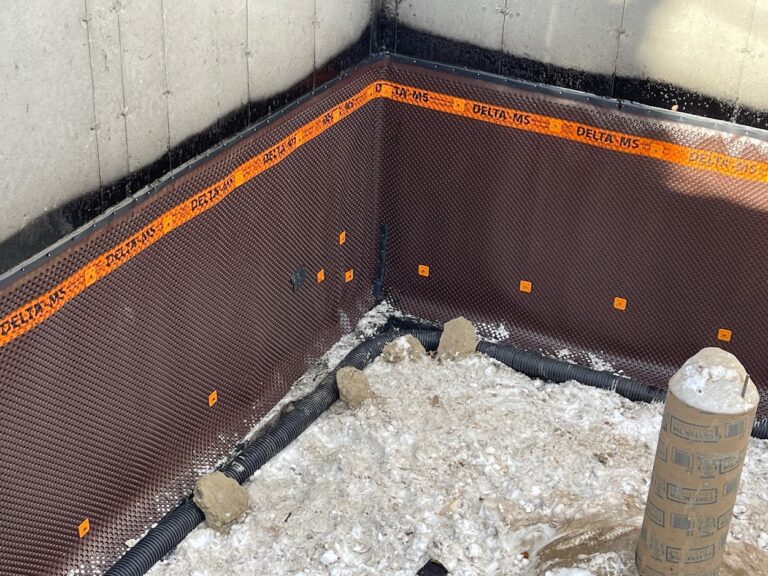 Foundation insulation installation during Calgary residential construction