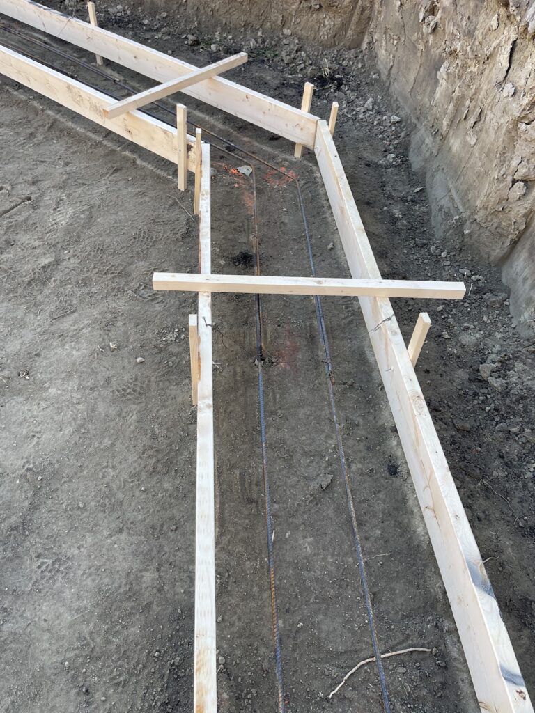 Foundation layout and construction preparation for Calgary home addition
