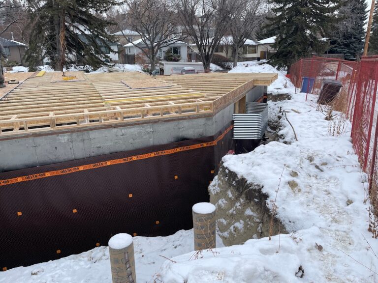 Foundation wall construction during a Calgary home renovation project