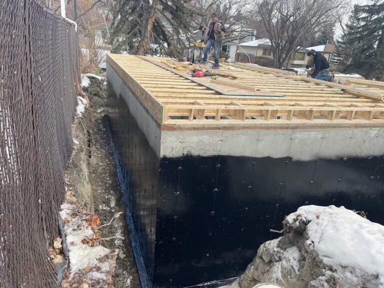 Foundation waterproofing work during a Calgary home addition project