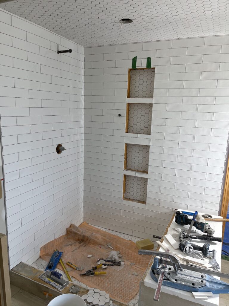 Interior wall feature and finishing improvements during Calgary renovation project