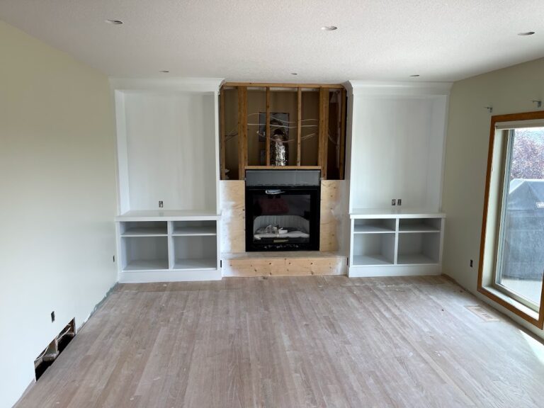Living room renovation with updated fireplace area in Calgary