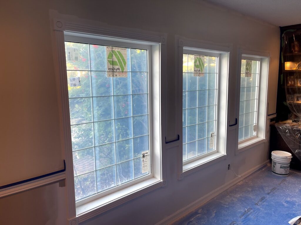 Main floor interior renovation featuring large residential windows in Calgary