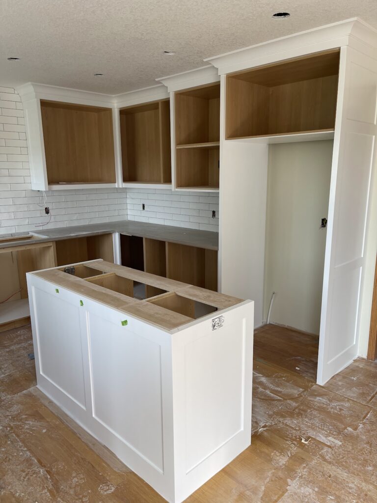 Modern kitchen cabinetry and storage upgrade in Calgary residence